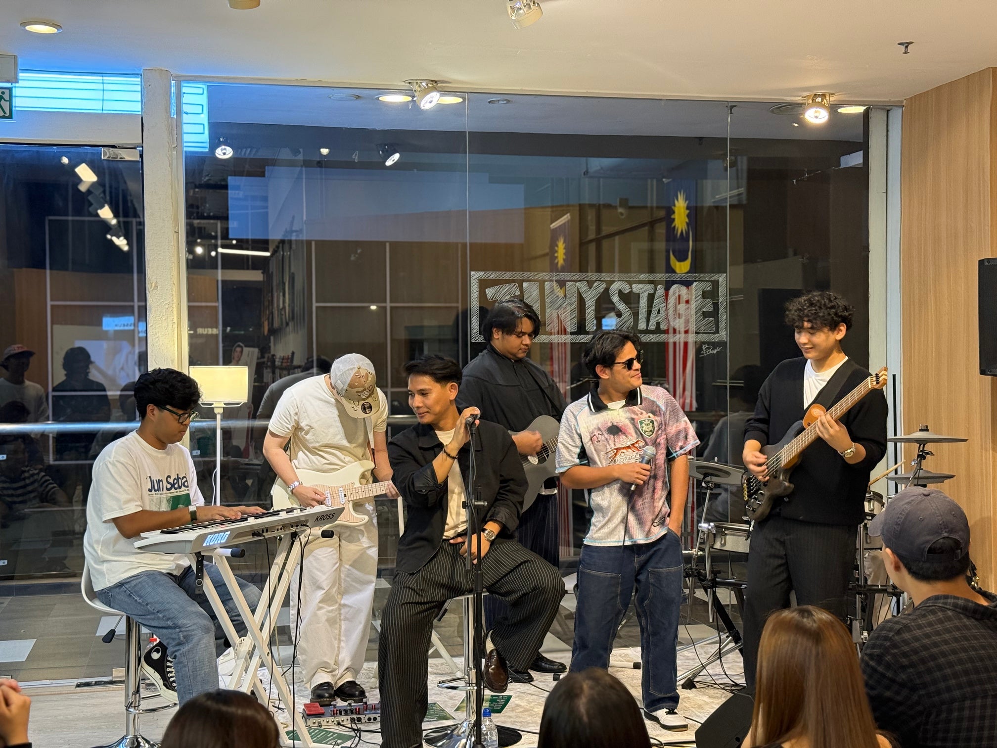 Pinstripes performing together at Tiny Stage